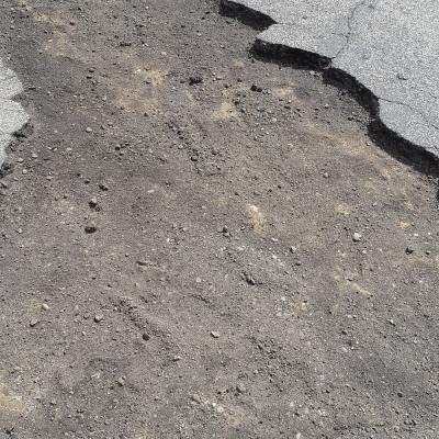 Hot Asphalt Patching - removing damaged asphalt