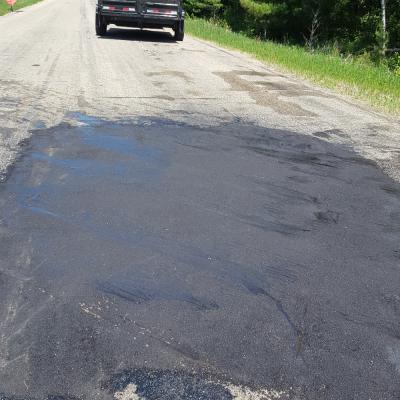 Hot Asphalt Patching - patching on road